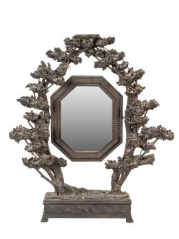 702.  Espejo de tocador basculante de forma octogonal, con decoración vegetal.S. XIX.