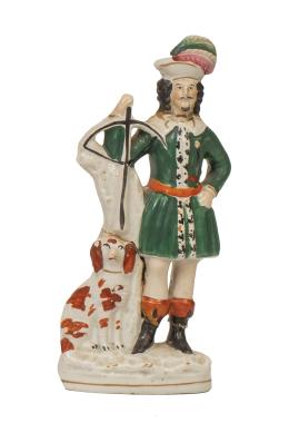 713.  Escocés con perro.Figura escultórica de loza policromada.Inglaterra, S. XIX.