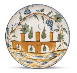 534.  Plato de cerámica esmaltada en verde oliva, ocre y azul. Decorado con arquitectura y hojas.Ribesalbes, S. XIX.