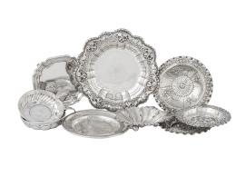 798.  Lote de nueve ceniceros y bandejitas de plata, con diferentes marcas, una de Matilde Espuñes (1909-1950)