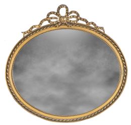 1344.  Espejo oval de madera tallada y dorada de estilo Luis XVI.Trabajo francés, primera mitad del S. XX.