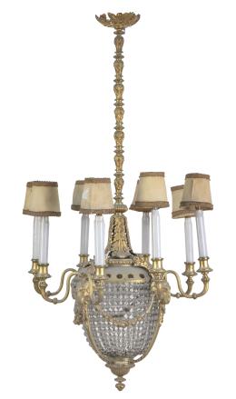 761.  Lámpara de cristal y bronce dorado de estilo Luis XVI de ocho brazos de luz.Francia, principios del S. XX.