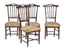 1246.  Juego de cuatro sillas de madera tallada de caoba.Francia, finales del S. XIX.