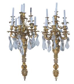 1184.  Pareja de apliques Napoleón IIII de nueve brazos de luz en bronce y cristal.Francia, último cuarto del S. XIX.