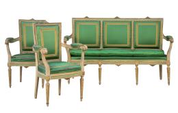 1147.  Sofá y dos butacas Carlos IV de madera lacada de blanco y dorada con tapicería de seda verde.España, h. 1800.