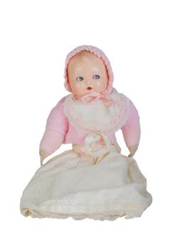 1301.  Muñeca de trapo y cartón piedra, vestida de rosa con faldón.España, años 40.