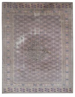 625.  Alfombra en seda de campo beige y motivos geométricos.
Per