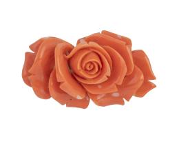 91.  Rosa realizada en coral tallado
