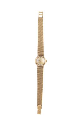 368.  Reloj de pulsera OMEGA Ladymatic de señora en oro