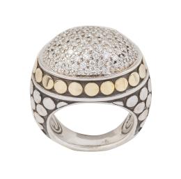 167.  Sortija bombée con óvalo de pavé de brillantes central, y decoración de círculos lisos sobre fondo pavonado