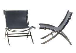 1233.  Antonio Citterio (Meda, Italia, 1950).Pareja de sillones modelo "Scissor" de metal cromado con asiento y respaldo de cuero.Años 80.