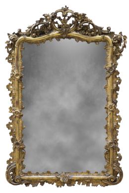1351.  Espejo de madera tallada y dorada con flores en el copete y decoración de rocalla.Francia, último cuarto del S. XIX.