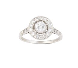 134.  Sortija ojo de perdiz de brillantes con centro de  0,30 ct 