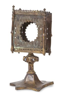 1007.  Relicario gótico en bronce, con restos de dorado y esmaltes en cabujón.Francia?, S. XV.