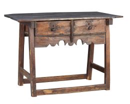 506.  Mesa limosnera de madera tallada, con dos cajones y frente recortado.España, S. XVIII.