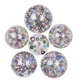 767.  Lote de seis pisapapeles de diferente tamaño, con decoración de "millefiori".S. XIX.