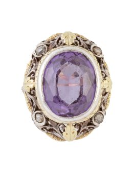 9.  Sortija S. XIX con amatista oval en montura labrada decorada con diamantes