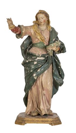 1194.  Virgen en madera tallada y policromada.
España, S. XVIII.