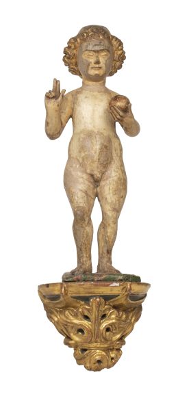 1082.  Niño Jesús.
Escultura de madera tallada con restos de poli