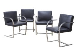 1420.  Lote de cuatro sillas Brno en acero y piel negra.Según diseño de Mies van der Rohe (1886 - 1969), Vitra.
