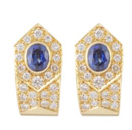 263.  Pendientes con zafiro central oval en banda cuajada de bril