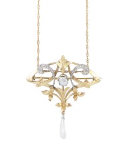 72.  Broche-colgante Art Nouveau de formas vegetales con perlas y diamantes
