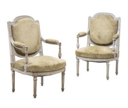 1229.  Pareja de sillas de brazos de estilo Luis XVI de madera tallada y policromada.Francia, finales del S. XIX.