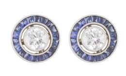 122.  Pendientes ojo de perdiz con centros de brillantes de 0,50 