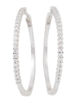 313.  Pendientes criollas con frente de brillantes engastados en garras