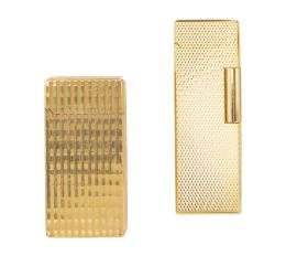 429.  Conjunto de dos encendedores vintage en metal plaqué or