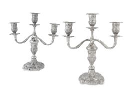 1241.  Pareja de candelabros de plata de tres luces. Con marcas.Durán, Madrid, Villa y Corte, 1929.