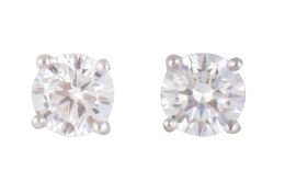 303.  Pendientes dormilonas con brillantes de 0,40 ct aprox cada uno