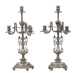 1344.  Pareja de candelabros de plata de cuatro luces. Con marcas.Rovira, Barcelona, S. XIX.