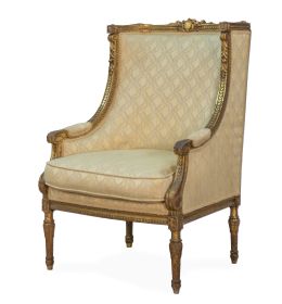 749.  Butaca de estilo Luis XVI de madera tallada y dorada.h. 1900.