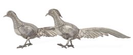 612.  Pareja de faisanes decorativos de plata.España, S. XX.
