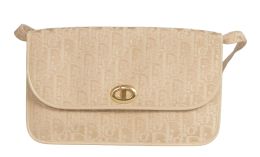444.  Bolso cartera DIOR vintage en color marfil, realizada con tela con monograma y piel, con asa desmontable
