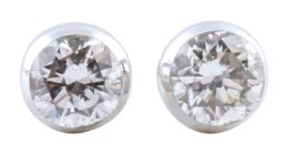 209.  Pendientes dormilonas con brillante en chatón