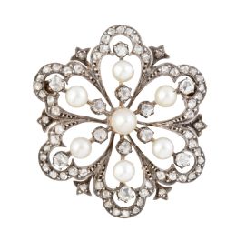 75.  Broche-colgante de ff. S. XIX a modo de rosetón floral de d
