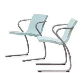 1290.  "Magic Chair".Pareja de sillas de brazos en acero tubular y poliuretano azul.Ross Lovegrove para Fasem, Italia, 1997.