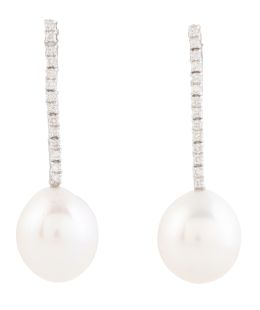 312.  Pendientes largos con perla ovoide que pende de rivière de brillantes