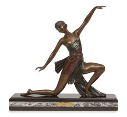 574.  Josef Lorenz (1892-1950). Con cartela en la peana.Bailarina Art Decó de bronce patinado y policromado, sobre peana de mármol.Austria, h. 1930.