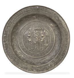 995.  Plato limosnero de estaño con figuras de Adán y Eva.Principios del S. XVII.