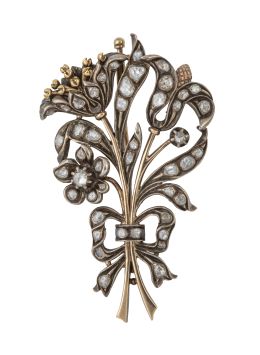 23.  Broche S. XIX con diseño de ramo de flores y lazo decorado con diamantes de talla rosa