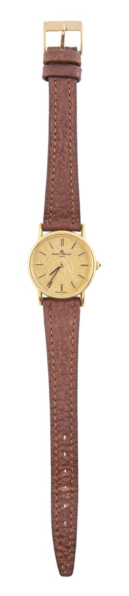 336.  Reloj BAUMER MERCIER de señora en oro