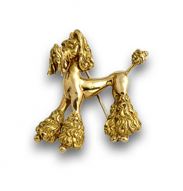 748.  Broche en forma de caniche en oro de 18K.