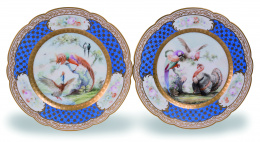 1133.  Pareja de platos Luis Felipe de porcelana esmaltada y dorada.Sévres, h. 1844.