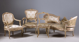 1096.  Juego de cuatro sillas de estilo rococó de madera lacada de blanco y dorado. h. 1890..