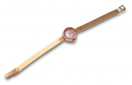 595.  Reloj Omega años 60 en oro de 18K con cristal rosa .