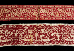 331.  Lienzo bordado en seda encarnada, con decoración simétrica de grifos enfrentados y un jarrón central, rodeado por decoración vegetal.S. XVI.