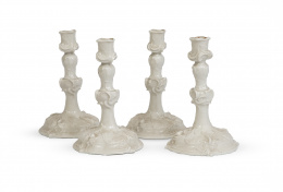 541.  Cuatro candeleros estilo rococó en porcelana esmaltada.Nynphemburg, Alemania, S. XX.